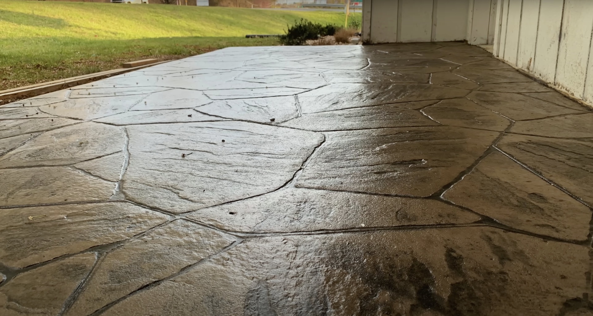 Before concrete repair - damaged driveway needing Burien Concrete expertise Cracked concrete driveway requiring professional repair services in Burien, WA