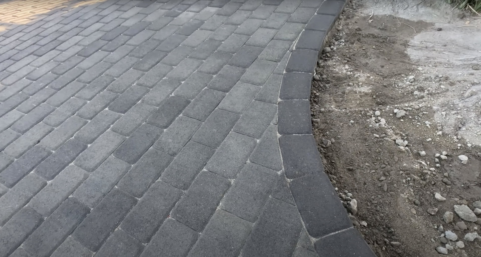 Professional paver installation by Burien Concrete craftsmen High-quality concrete paver installation in progress showing professional workmanship