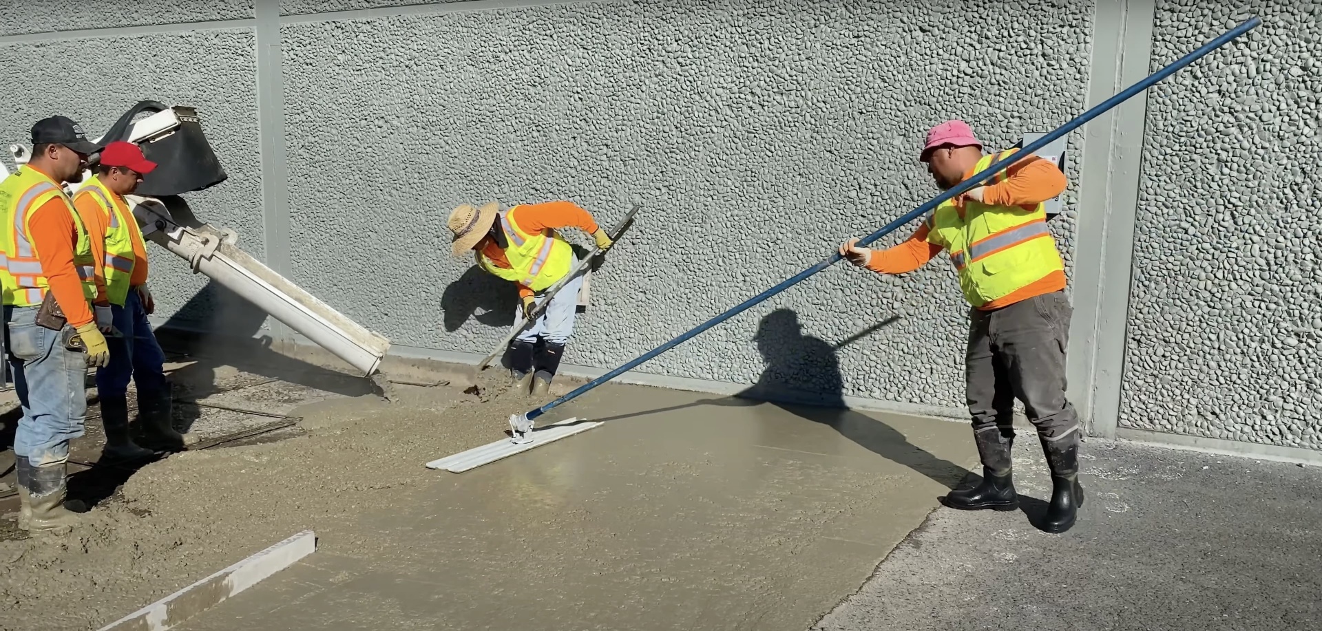 Professional concrete placement with laser-guided equipment by Burien Concrete Advanced concrete placement and leveling using laser-guided screed equipment for precision results