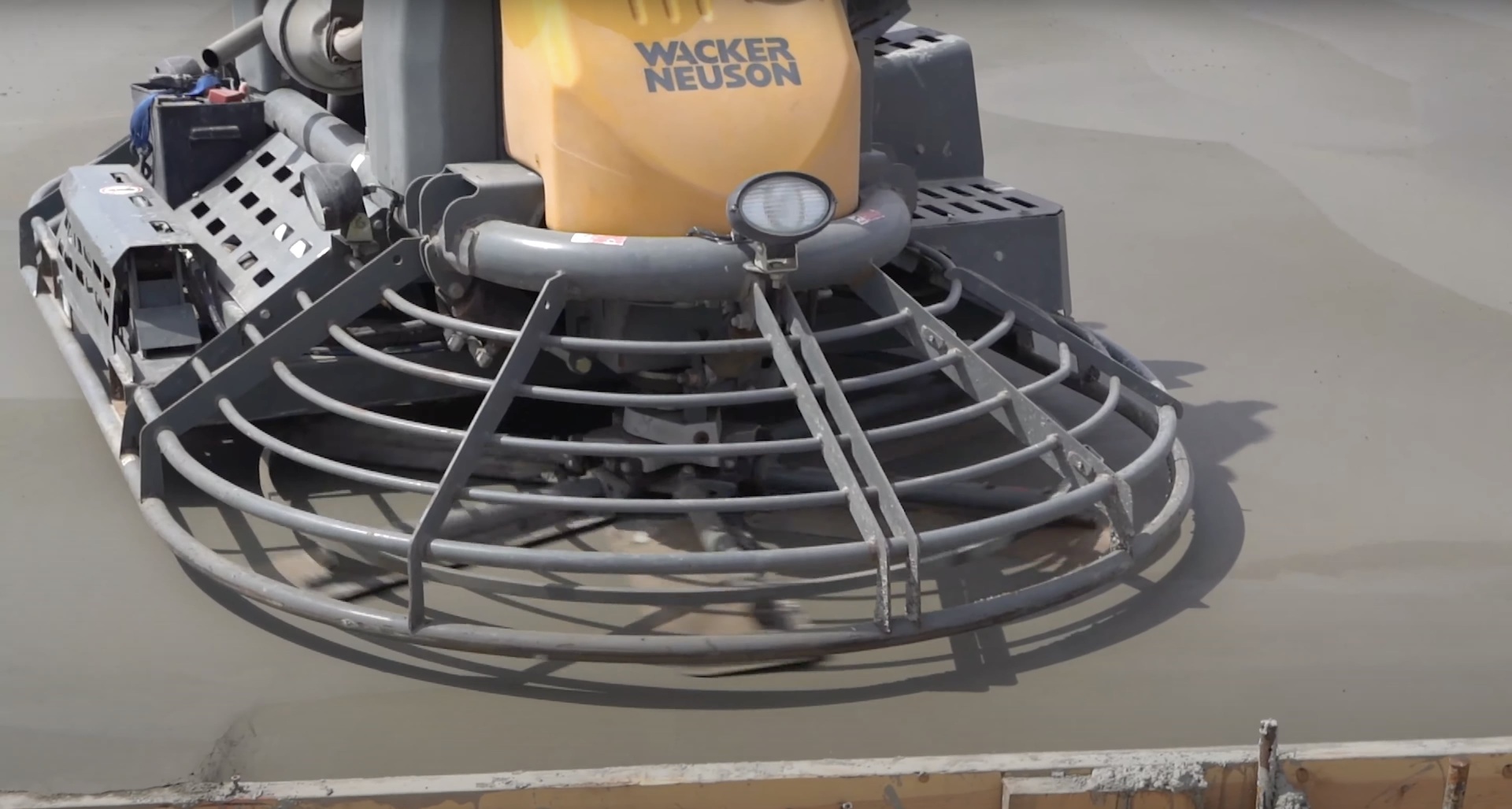 State-of-the-art concrete finishing equipment used by Burien Concrete Professional concrete finishing equipment - power trowel for smooth concrete surfaces